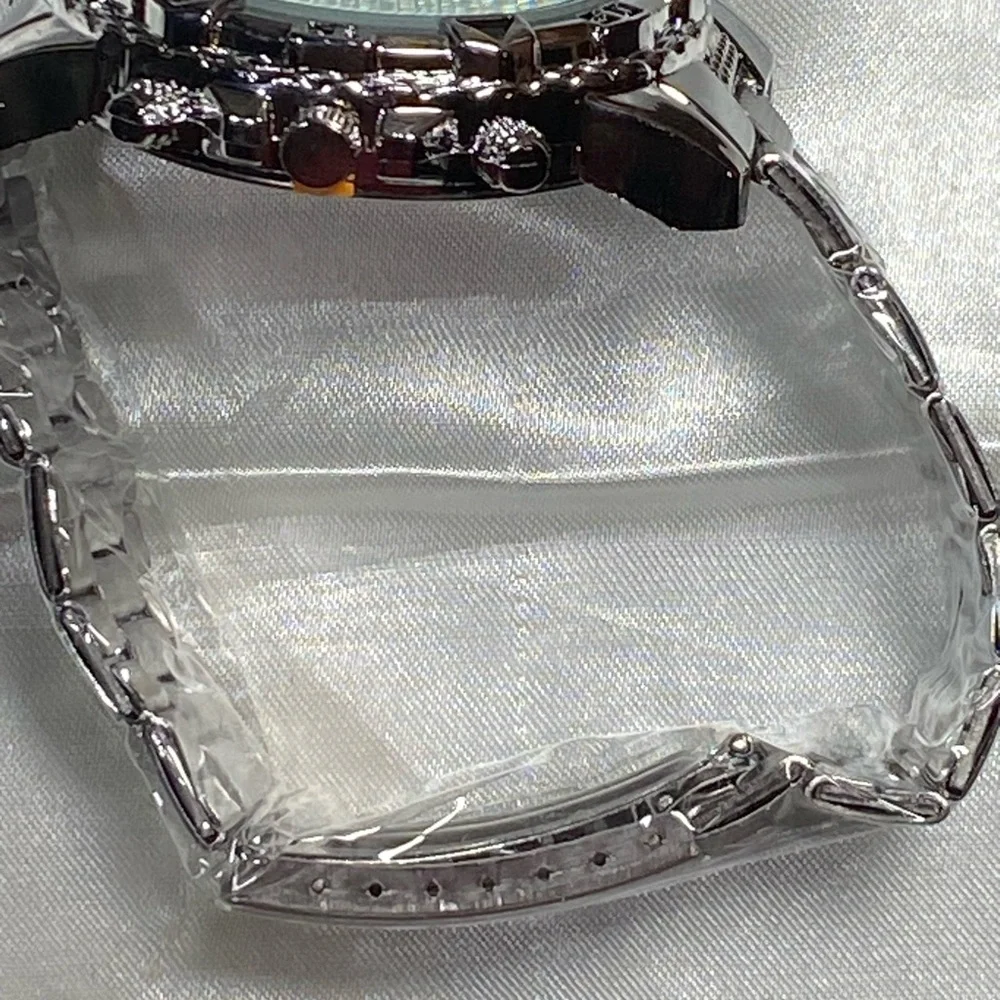 Geneva Silver style.  Watch with Textured Band $20 each or 2 for $30